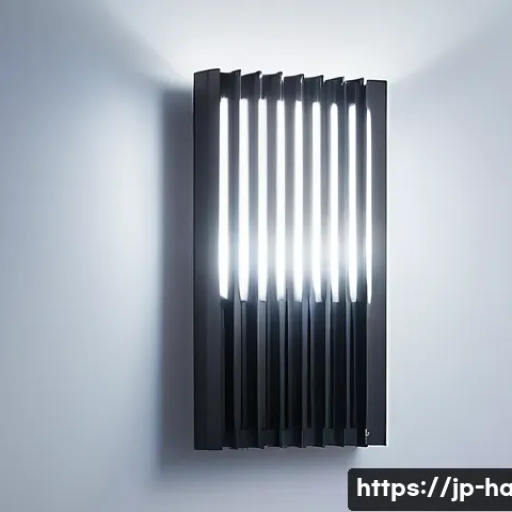 LED 조명의 수명 연장법 - A modern LED lighting fixture with an aluminum heat sink, installed on a wall with visible air gaps ...