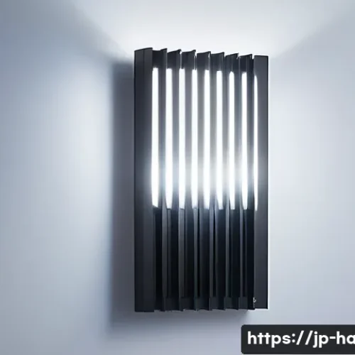 LED 조명의 수명 연장법 - A modern LED lighting fixture with an aluminum heat sink, installed on a wall with visible air gaps ...